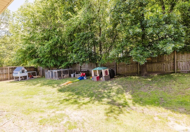 51 Waters Edge Dr, Little Rock, AR 72204 - view of yard with exterior structure and an outbuilding
