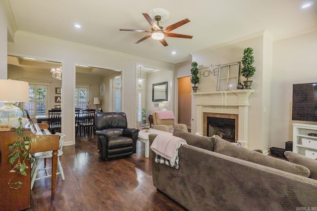 51 Waters Edge Dr, Little Rock, AR 72204 - living area with crown molding, ceiling fan, dark wood finished floors, a fireplace, and recessed lighting
