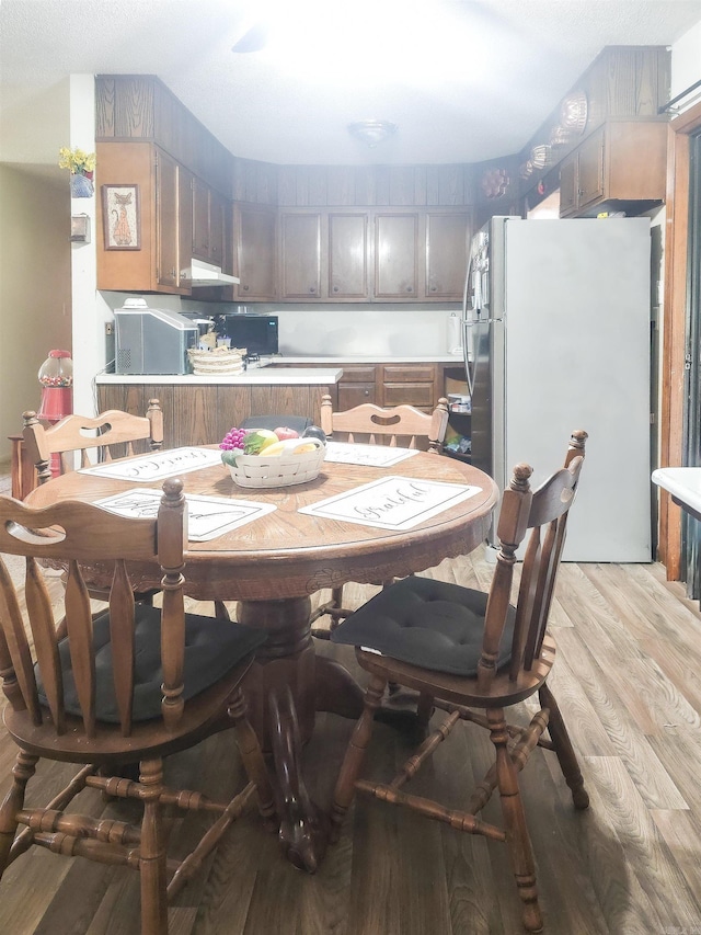 163 Junior Cir, Clinton, AR 72031 - dining space featuring light wood-type flooring