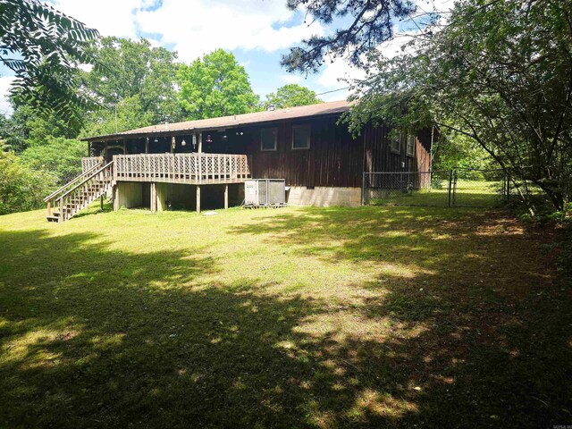 163 Junior Cir, Clinton, AR 72031 - rear view of house featuring stairway, a wooden deck, and central air condition unit