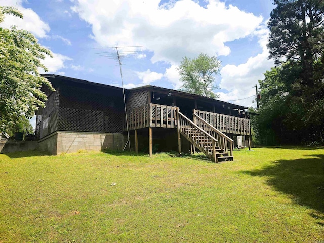 163 Junior Cir, Clinton, AR 72031 - rear view of property with a lawn, stairway, and a wooden deck