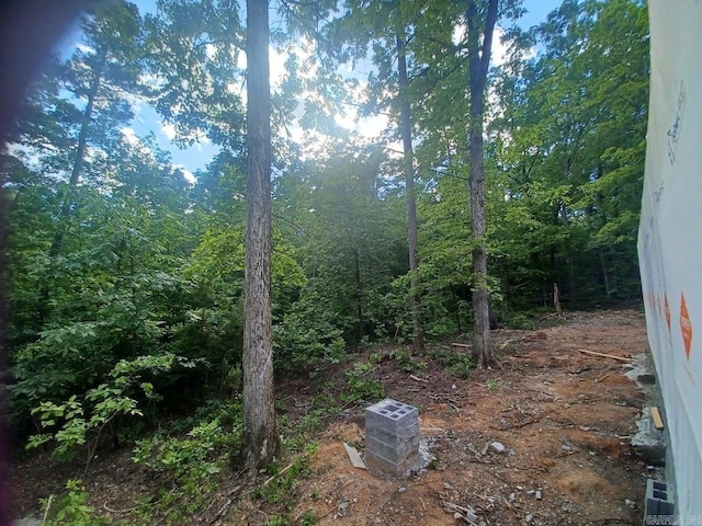 32 Propio Way, Hot Springs Village, AR 71909 - view of yard with a wooded view