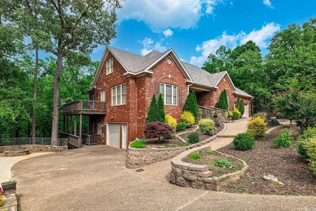 134 Myrick Ln, Hot Springs, AR 71913 - view of front of property with brick siding, an attached garage, driveway, a shingled roof, and a deck