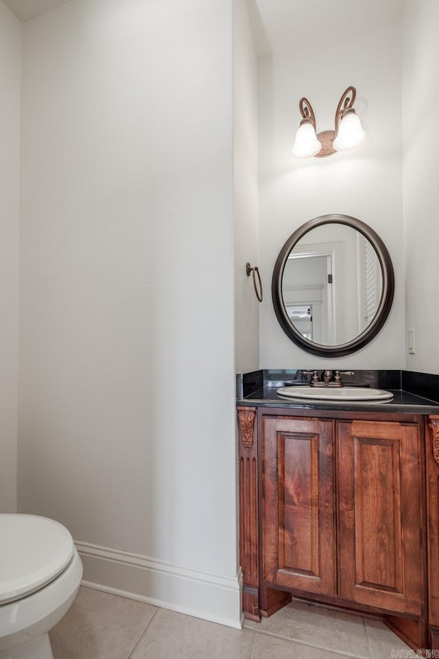 134 Myrick Ln, Hot Springs, AR 71913 - half bath featuring tile patterned floors, vanity, baseboards, and toilet
