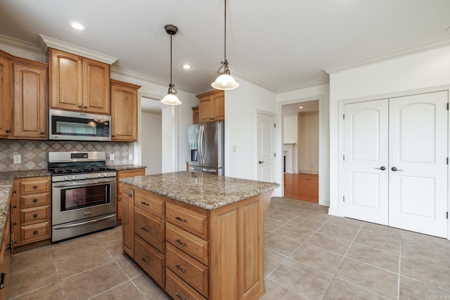 134 Myrick Ln, Hot Springs, AR 71913 - kitchen featuring appliances with stainless steel finishes, crown molding, light stone countertops, tasteful backsplash, and light tile patterned floors