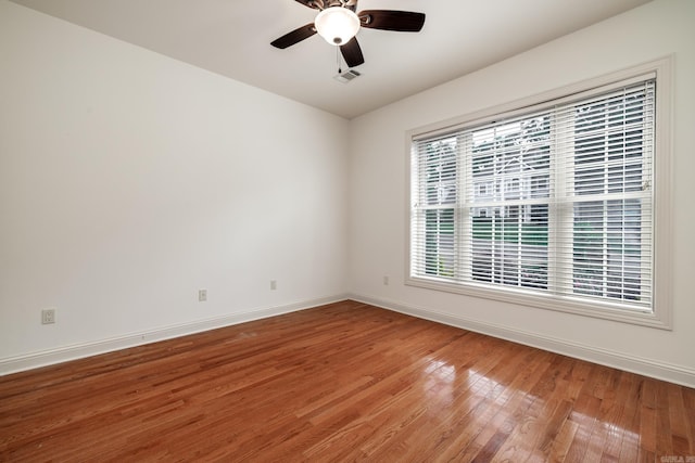 134 Myrick Ln, Hot Springs, AR 71913 - spare room with baseboards, light wood-style flooring, and ceiling fan
