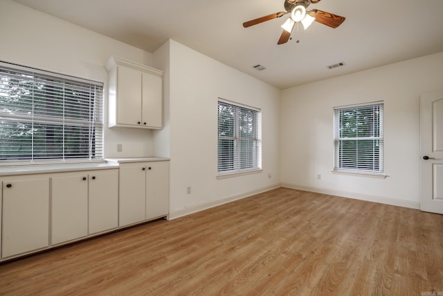 134 Myrick Ln, Hot Springs, AR 71913 - unfurnished dining area featuring light wood finished floors, ceiling fan, and baseboards