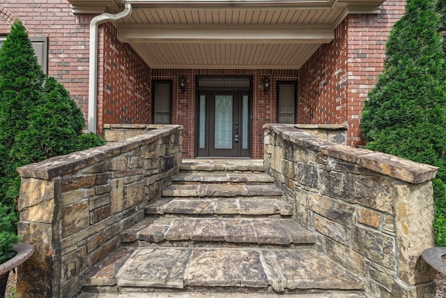 134 Myrick Ln, Hot Springs, AR 71913 - property entrance featuring a porch and brick siding