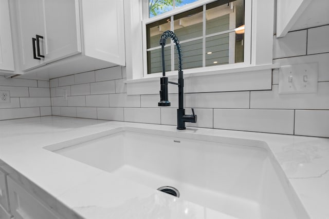 detailed view of a sink and backsplash