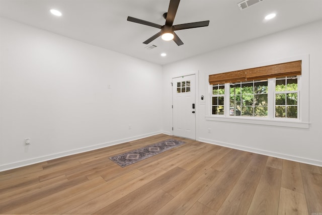 foyer with a ceiling fan, light wood-type flooring, baseboards, and recessed lighting