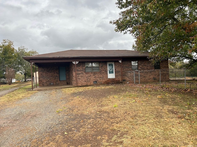 18 Garland Spgs, Mount Vernon, AR 72111 - view of front of property with brick siding, fence, gravel driveway, and roof with shingles