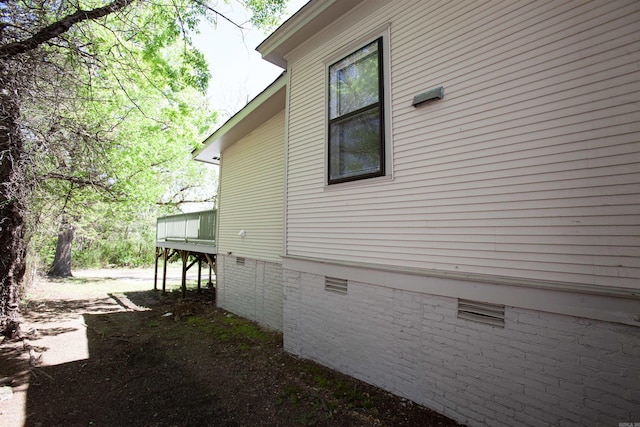 1409 Allis St, Little Rock, AR 72204 - view of home's exterior with crawl space and a deck
