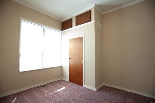 1409 Allis St, Little Rock, AR 72204 - unfurnished bedroom featuring carpet floors and ornamental molding