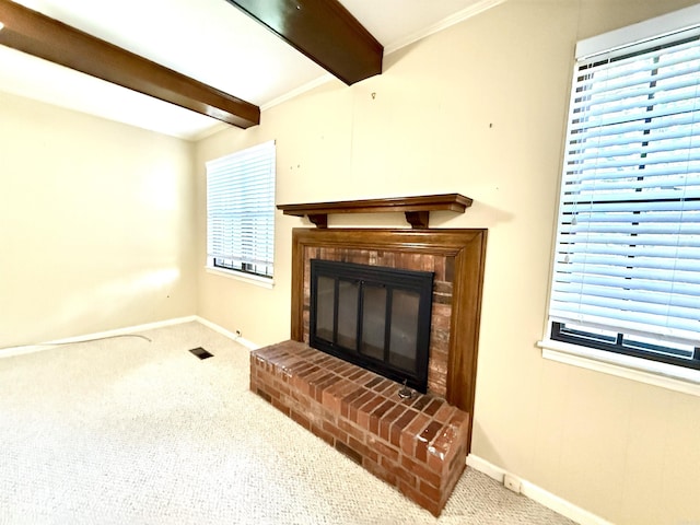 detailed view of beamed ceiling, carpet floors, a fireplace, and baseboards