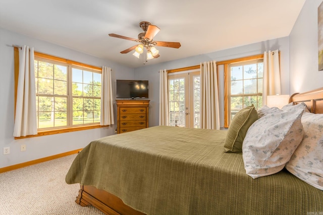 221 Skyline Dr, Greers Ferry, AR 72067 - bedroom featuring baseboards, access to exterior, carpet, a ceiling fan, and french doors