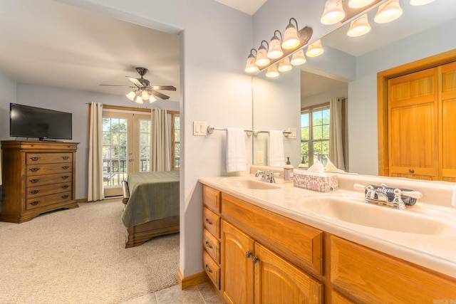 221 Skyline Dr, Greers Ferry, AR 72067 - full bathroom featuring ensuite bath, french doors, ceiling fan, double vanity, and baseboards