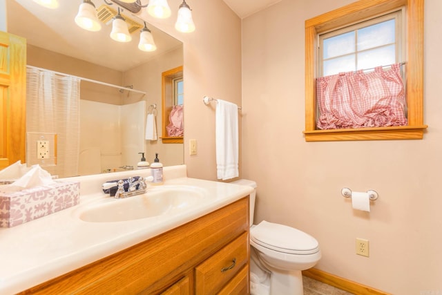 221 Skyline Dr, Greers Ferry, AR 72067 - full bathroom with toilet, a shower, vanity, and baseboards