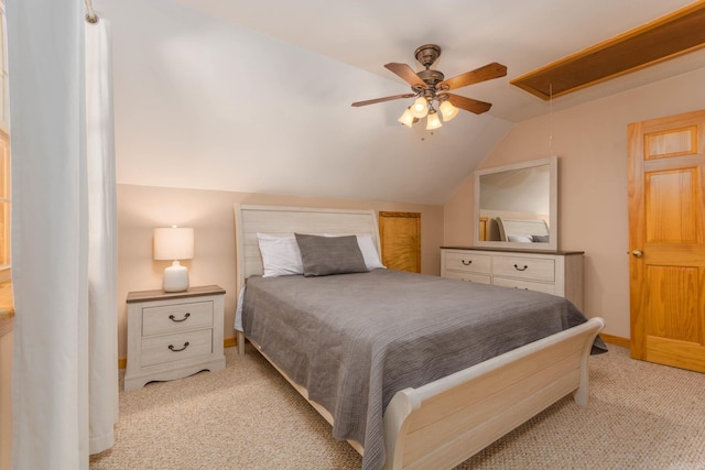 221 Skyline Dr, Greers Ferry, AR 72067 - bedroom with light carpet, attic access, vaulted ceiling, baseboards, and ceiling fan