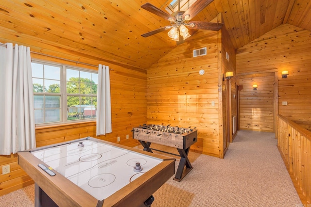 221 Skyline Dr, Greers Ferry, AR 72067 - game room with vaulted ceiling, wooden walls, wood ceiling, ceiling fan, and light colored carpet