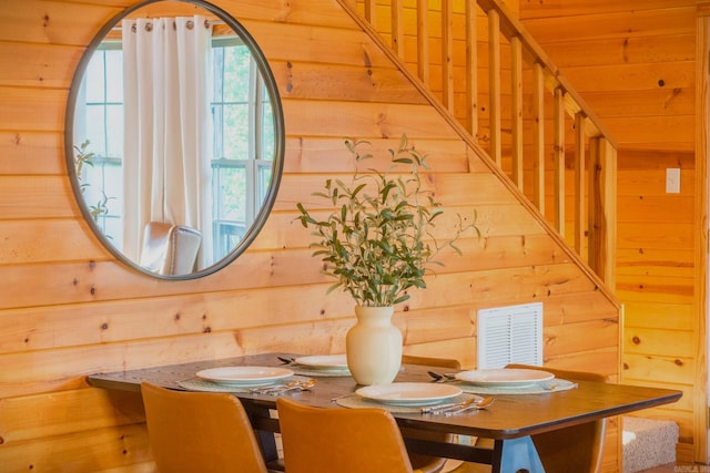 221 Skyline Dr, Greers Ferry, AR 72067 - dining space featuring wood walls and stairway
