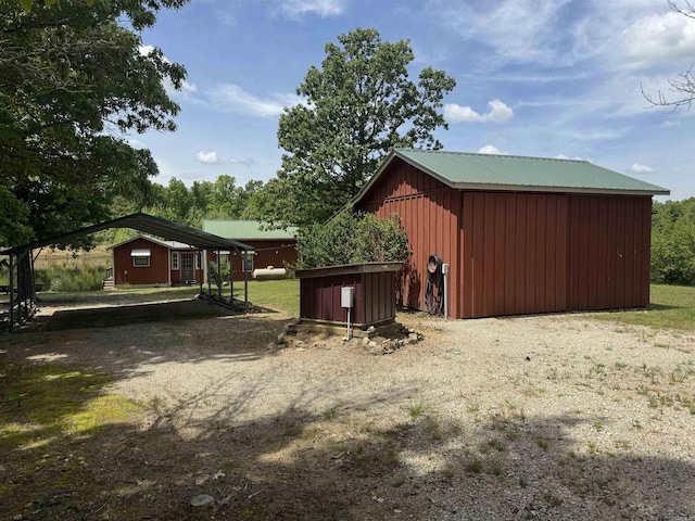 view of shed featuring a carport