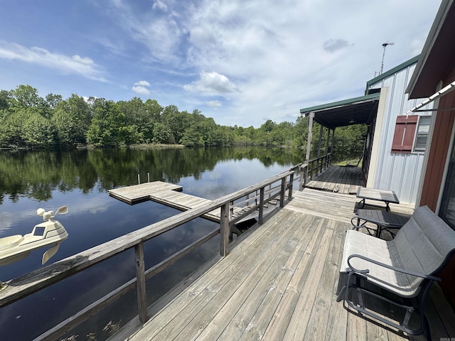 dock area featuring a water view