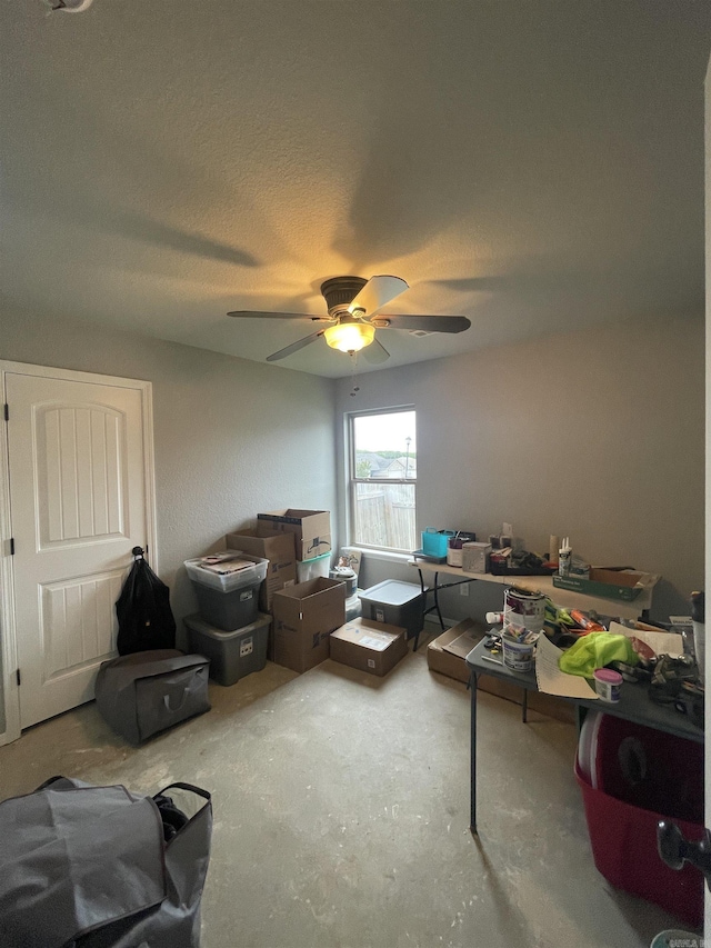 103 Sunflower Ln, Beebe, AR 72012 - interior space featuring a ceiling fan, concrete flooring, and a textured ceiling