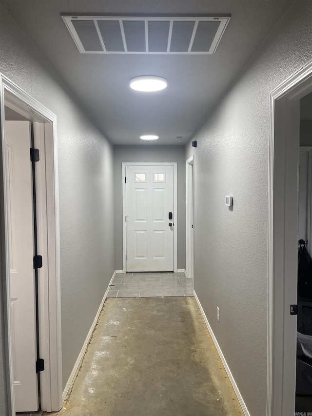 103 Sunflower Ln, Beebe, AR 72012 - hallway featuring baseboards and concrete floors