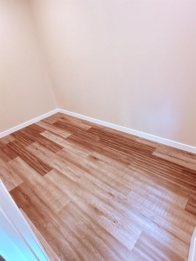 4090 Ar 56th Hwy, Wideman, AR 72585 - empty room featuring wood finished floors and baseboards
