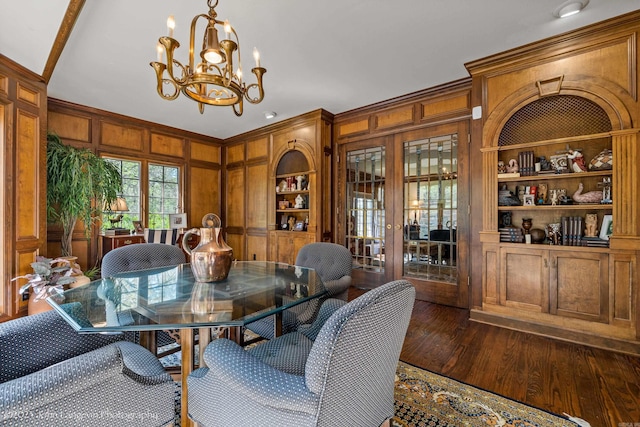 1920 Airpark Rd, Wynne, AR 72396 - dining room featuring built in features, a chandelier, wood finished floors, french doors, and wooden walls