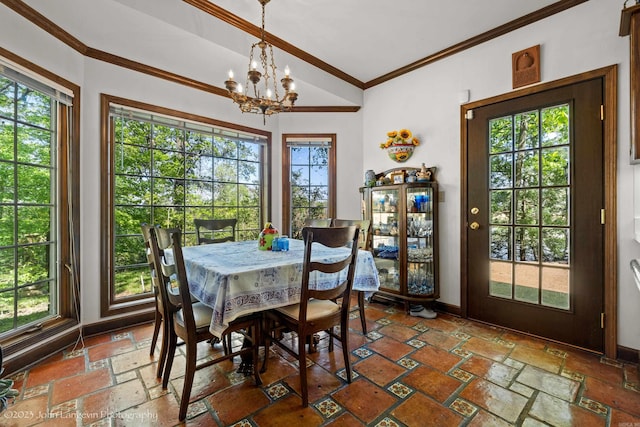 1920 Airpark Rd, Wynne, AR 72396 - dining space with crown molding, a chandelier, stone tile floors, and baseboards