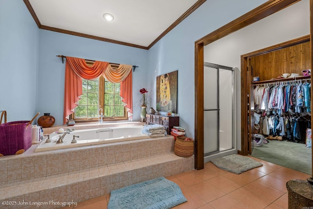 1920 Airpark Rd, Wynne, AR 72396 - full bath featuring ornamental molding, a shower stall, tile patterned floors, a bath, and a spacious closet