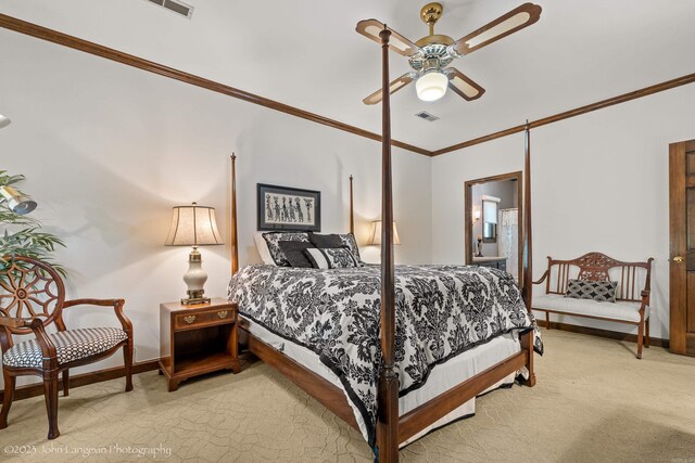 1920 Airpark Rd, Wynne, AR 72396 - bedroom with ornamental molding, light colored carpet, baseboards, ceiling fan, and ensuite bath
