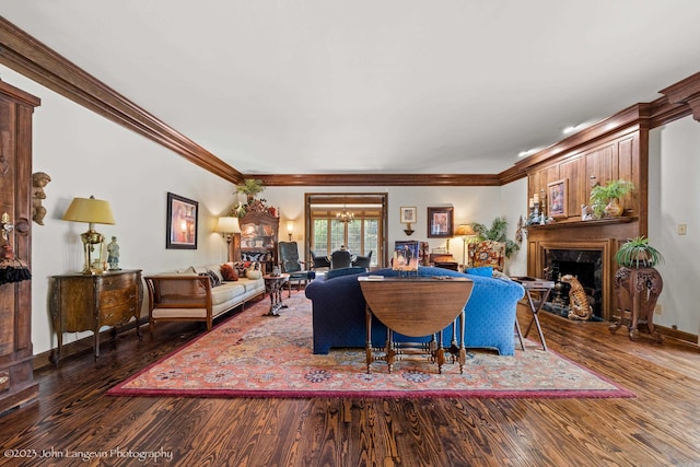 1920 Airpark Rd, Wynne, AR 72396 - living area with a fireplace, wood finished floors, ornamental molding, and baseboards