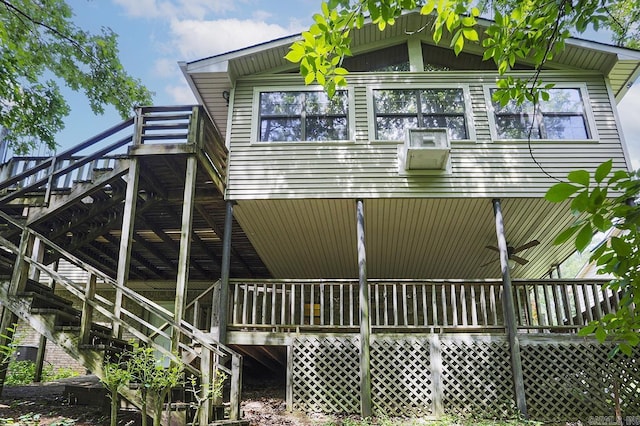 29 Flintwood Dr, Little Rock, AR 72227 - rear view of property with stairway and a wooden deck