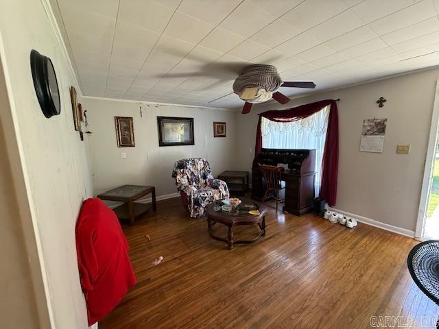 24/82 Whites Cut Rd, Carlisle, AR 72024 - living room with healthy amount of natural light, a ceiling fan, wood finished floors, and baseboards