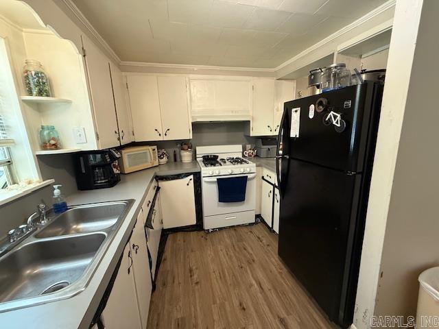 24/82 Whites Cut Rd, Carlisle, AR 72024 - kitchen with white appliances, a sink, white cabinetry, wood finished floors, and open shelves