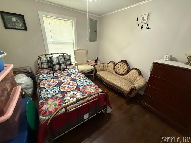 24/82 Whites Cut Rd, Carlisle, AR 72024 - bedroom featuring wood finished floors, crown molding, and electric panel