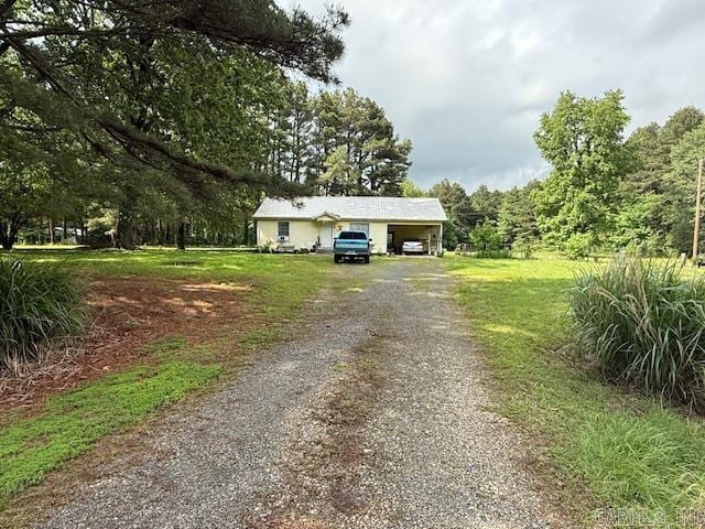 24/82 Whites Cut Rd, Carlisle, AR 72024 - view of front of property featuring driveway and a front lawn