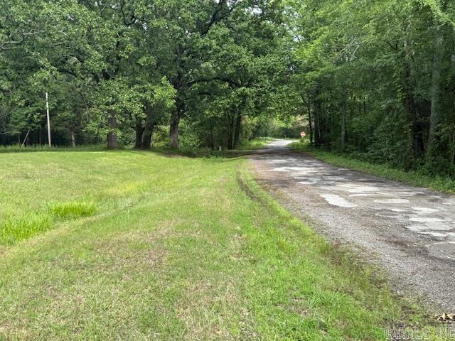 24/82 Whites Cut Rd, Carlisle, AR 72024 - view of road featuring a forest view
