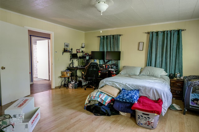 312 N E St, Harrisburg, AR 72432 - bedroom with crown molding and wood finished floors