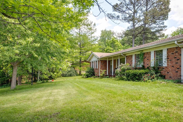312 N E St, Harrisburg, AR 72432 - view of grassy yard