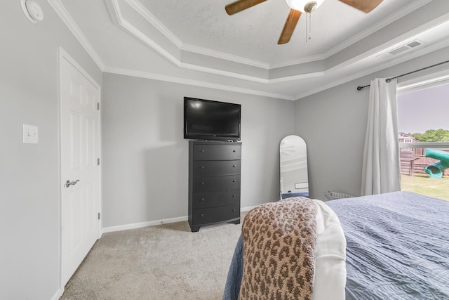142 Peach St, Austin, AR 72007 - carpeted bedroom with a raised ceiling, ornamental molding, ceiling fan, and baseboards