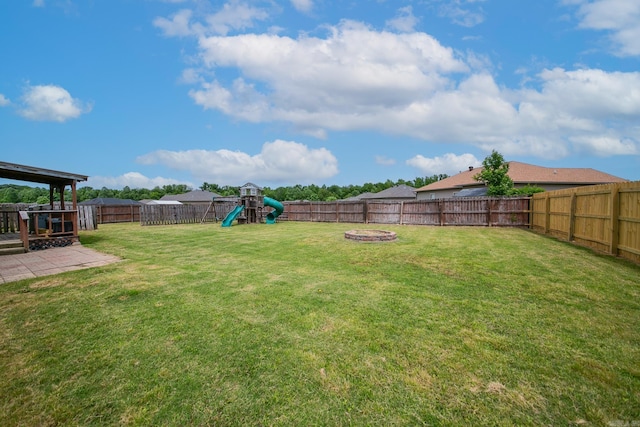 142 Peach St, Austin, AR 72007 - view of yard featuring a playground and a fire pit