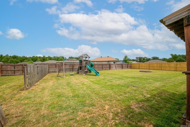 142 Peach St, Austin, AR 72007 - view of yard featuring a playground and an outdoor fire pit