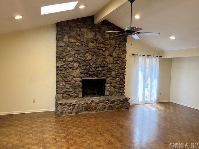 3112 Echo Valley Dr, Little Rock, AR 72227 - unfurnished living room with baseboards, a ceiling fan, a stone fireplace, and a skylight