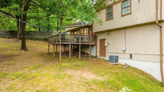 4 Desoto Forest Cv, Little Rock, AR 72211 - view of yard with a deck, fence, and central AC unit