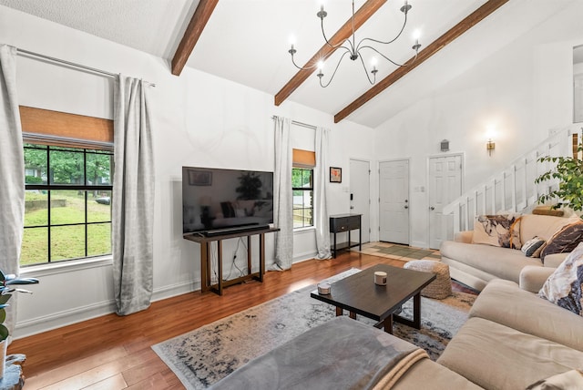 4 Desoto Forest Cv, Little Rock, AR 72211 - living room featuring beamed ceiling, hardwood / wood-style floors, high vaulted ceiling, baseboards, and stairs