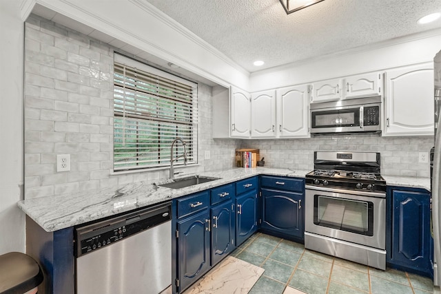 4 Desoto Forest Cv, Little Rock, AR 72211 - kitchen with appliances with stainless steel finishes, a sink, a textured ceiling, blue cabinets, and white cabinets