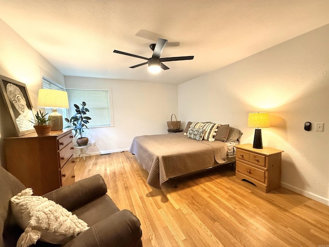 601 Clarence St, Mountain View, AR 72560 - bedroom featuring light wood-style flooring, baseboards, and ceiling fan
